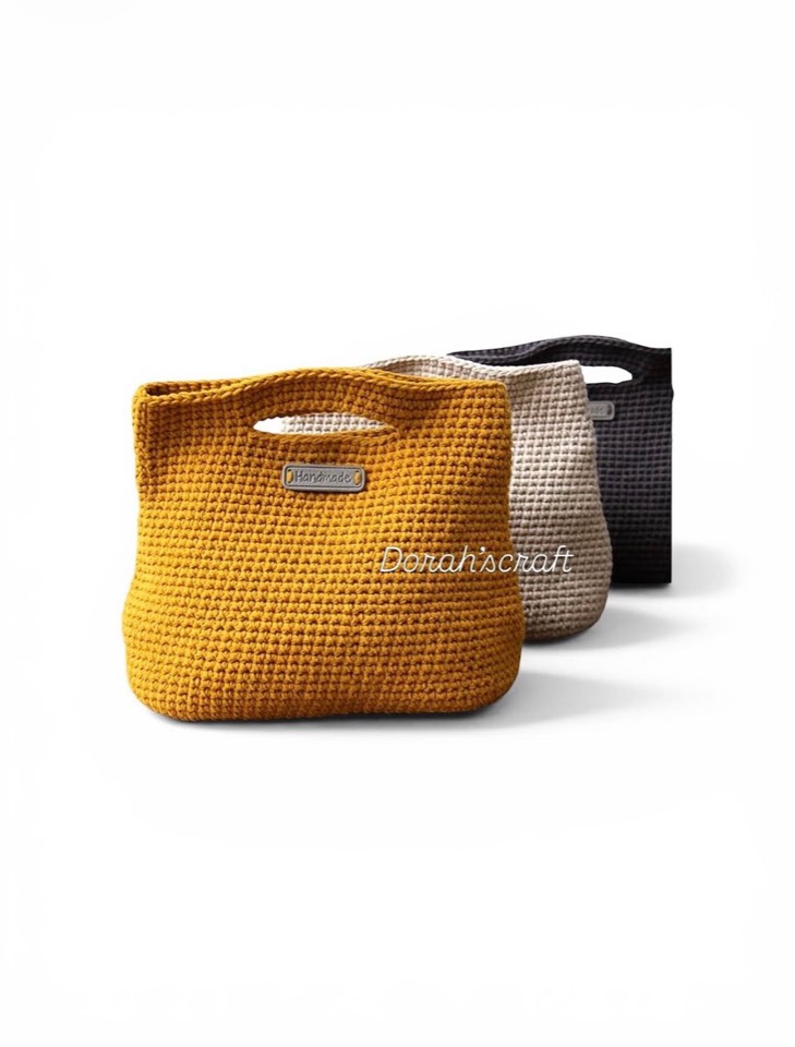Close-up of tight crochet stitches on the mustard tote